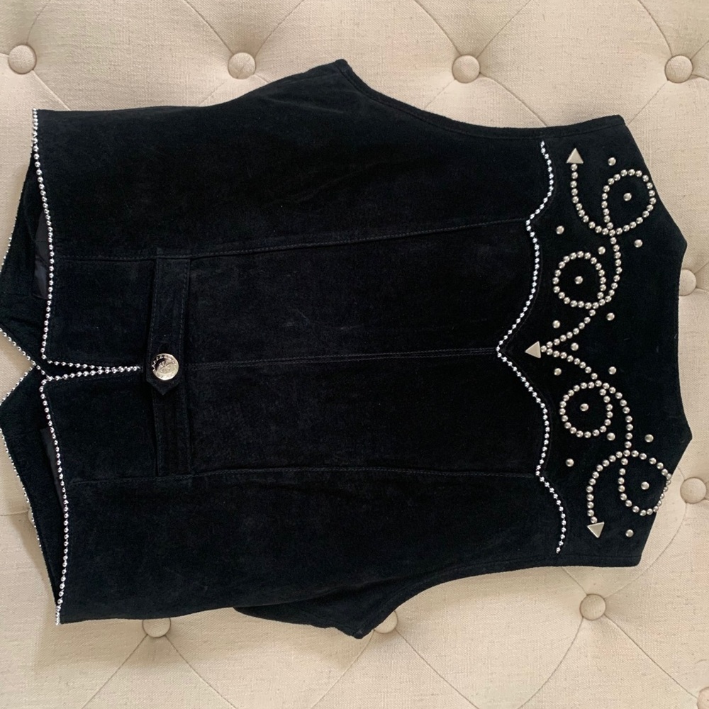 Leather western vest with metal detail